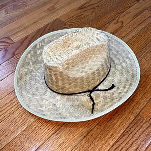 Straw Cowboy Hat With a Black Cord Band